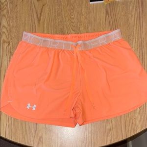 Bright orange Under Armour shorts